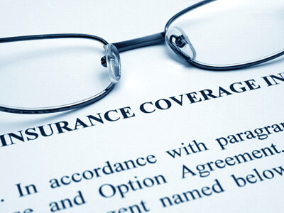glasses on an insurance form