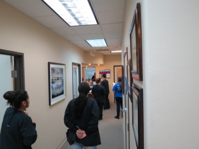 Dental team members in dental office hallway
