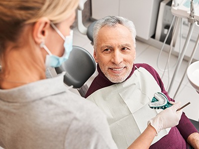 A patient getting dental impressions for dentures