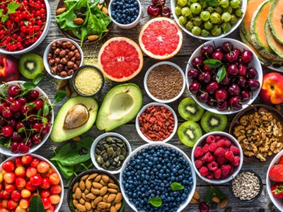 A selection of healthy foods laid out on a wooden table