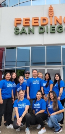 Encinitas dental team standing in front of Feeding America San Diego building