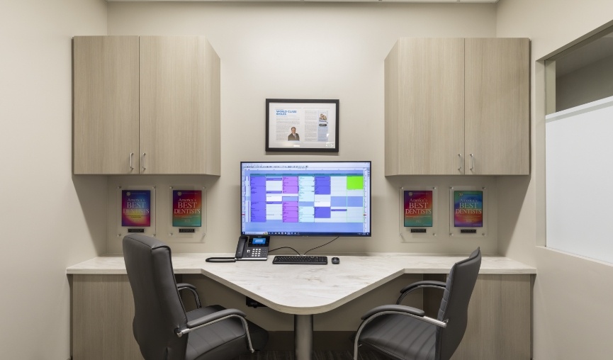 Computer screen showing spreadsheet for dental patient scheduling