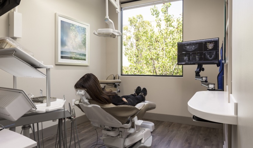 Woman leaning back in dental chair