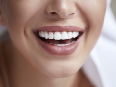 Close up of smile with straight white teeth