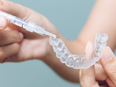 Take-home teeth whitening kit